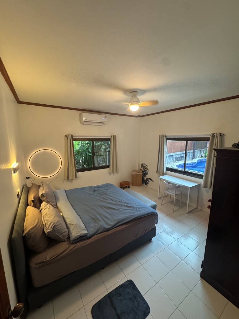 Bedroom with pool view