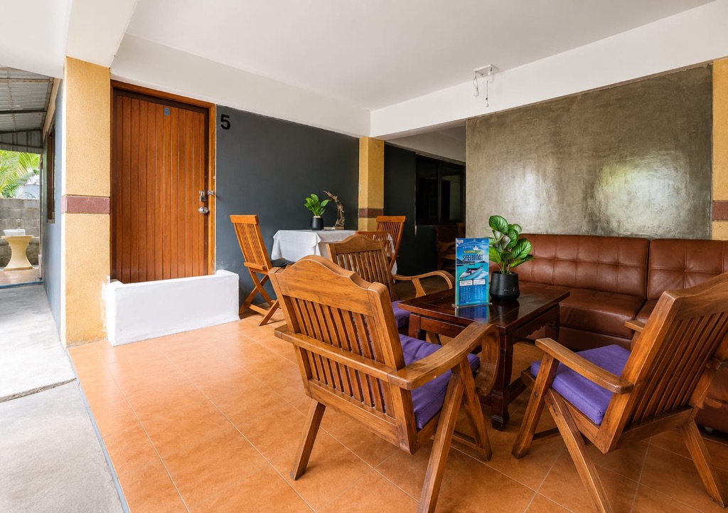Apartment 5 — private terrace with seating