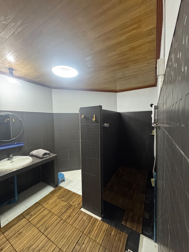 The Villa — large bathroom with rain shower
